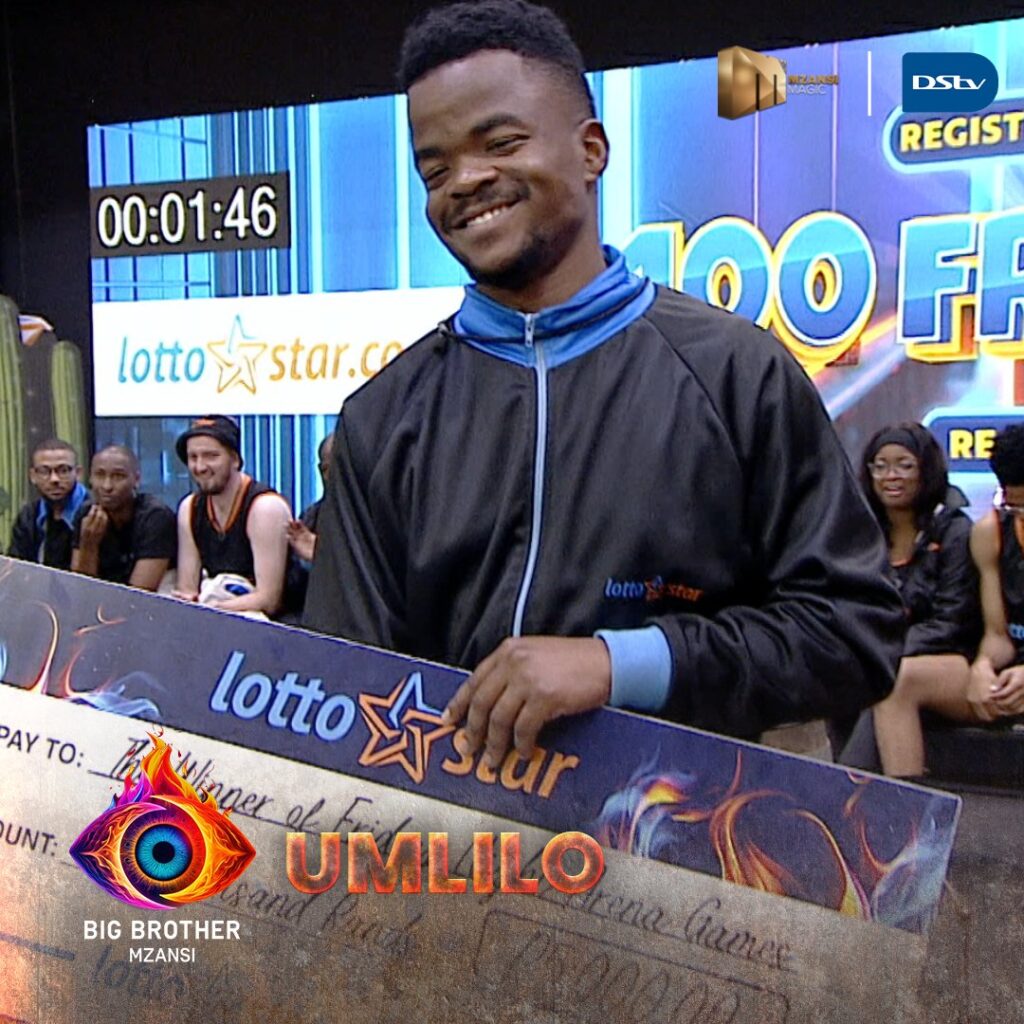 Uyanda being handled a check after winning the week 4 BBMzansi Friday arena games