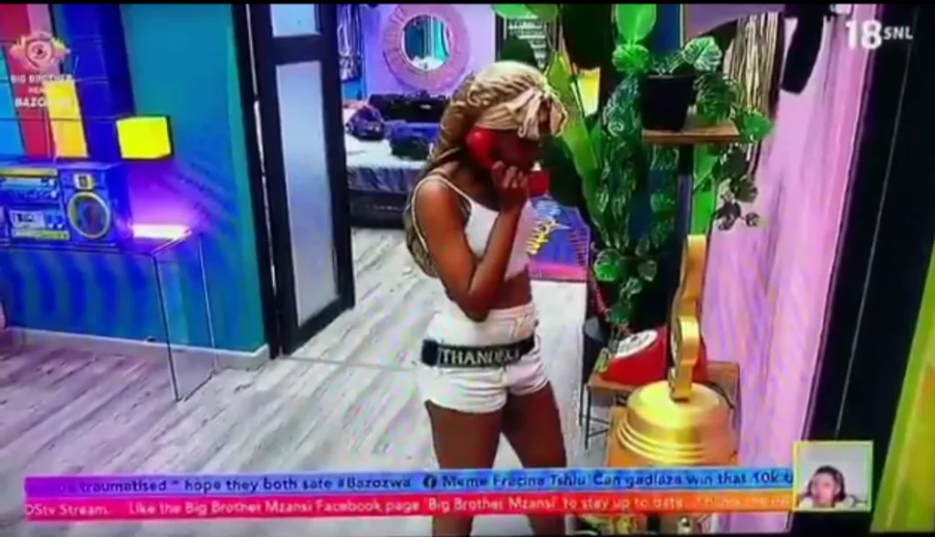 Thandeka answering the red phone